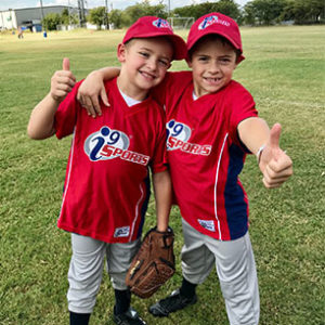testimonial-photos-thumbs-up Two baseball players give a thumbs up after a fun game